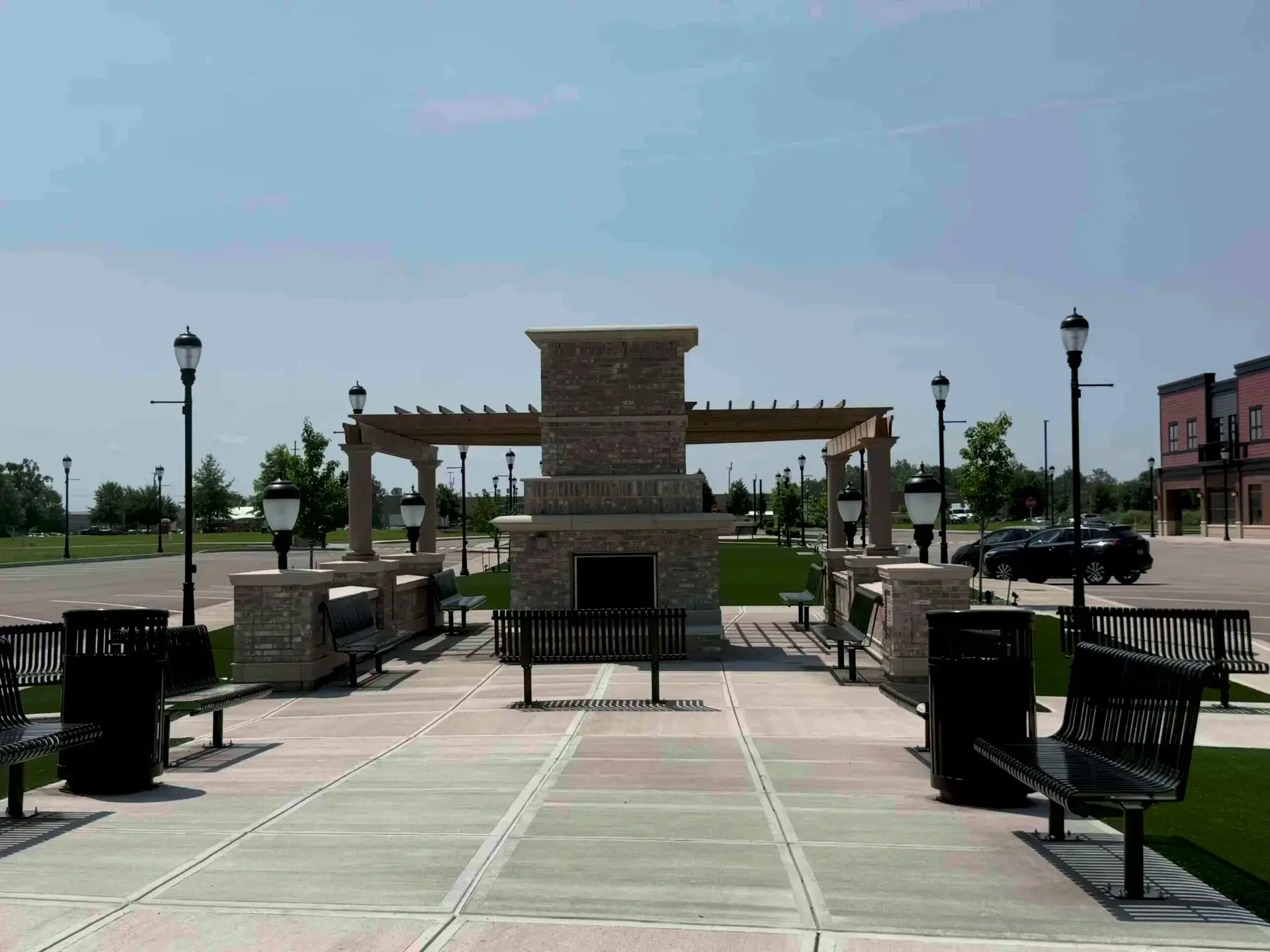 Stone fireplace and seating area at Park Drive Development